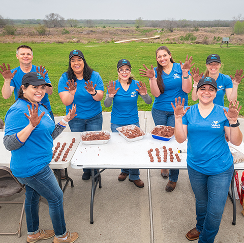 yd7610 volunteers prepare tree seeds for planting