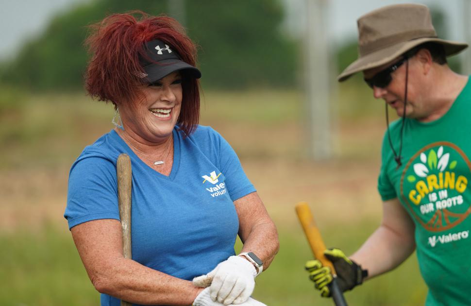 Volunteers laugh together at volunteer event