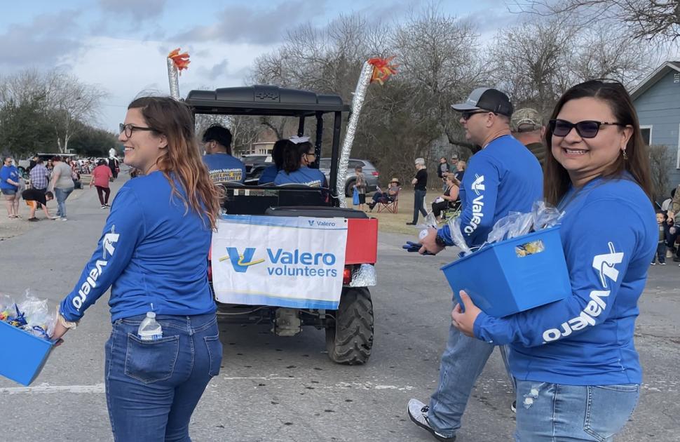 yd7610 volunteers during a parade, handing out goodies