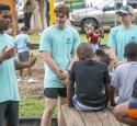 Interns at the Memphis Refinery talk to local children about their jobs